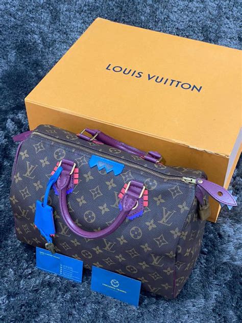 louis vuitton speedy 30 totem